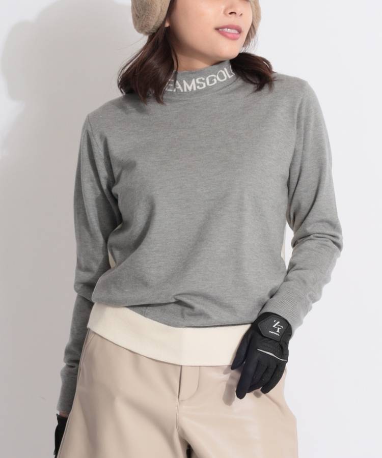 BE 【ストレッチ防風】バイカラー切替ネックロゴ裏地付きニットプルオーバー